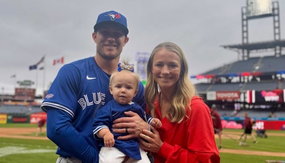 Baseball player Will Robertson, with his wife, Morgan, and daughter Jonnie.