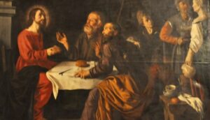 Jesus en Emaús con los discípulos.