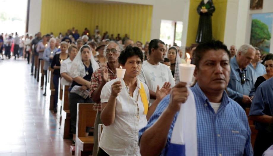 People praying in the cathedral in Managua, Nicaragua.