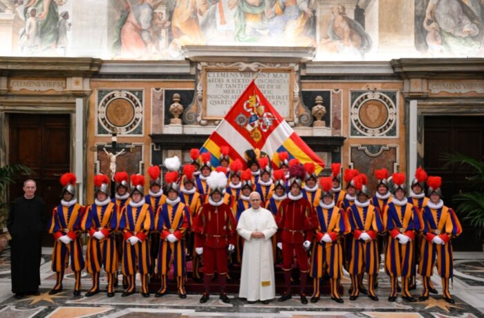Pope Leo XIV poses with the new recruits of the Swiss Guard.