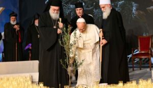 Pope and religious leaders plant olive tree in Beirut.