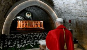 The Pope prays at the tomb of Saint Charbel.